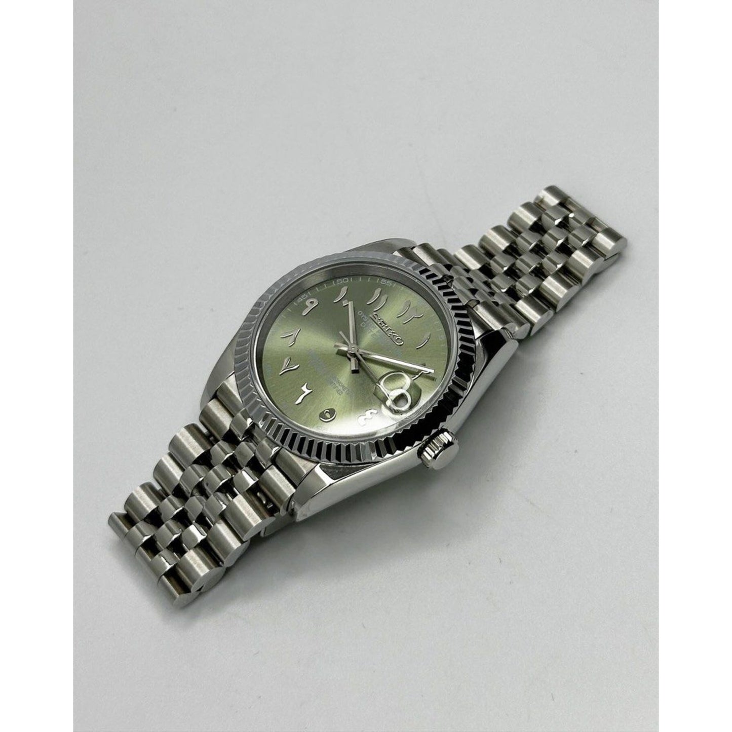 Seiko date-just Arabic Green dial 36/39