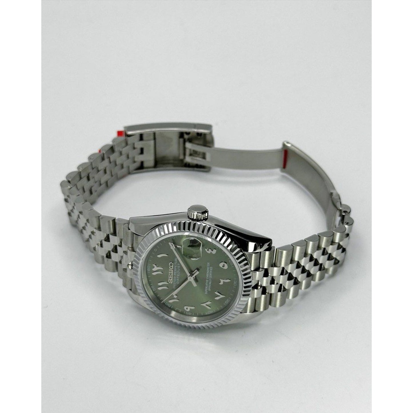 Seiko date-just Arabic Green dial 36/39